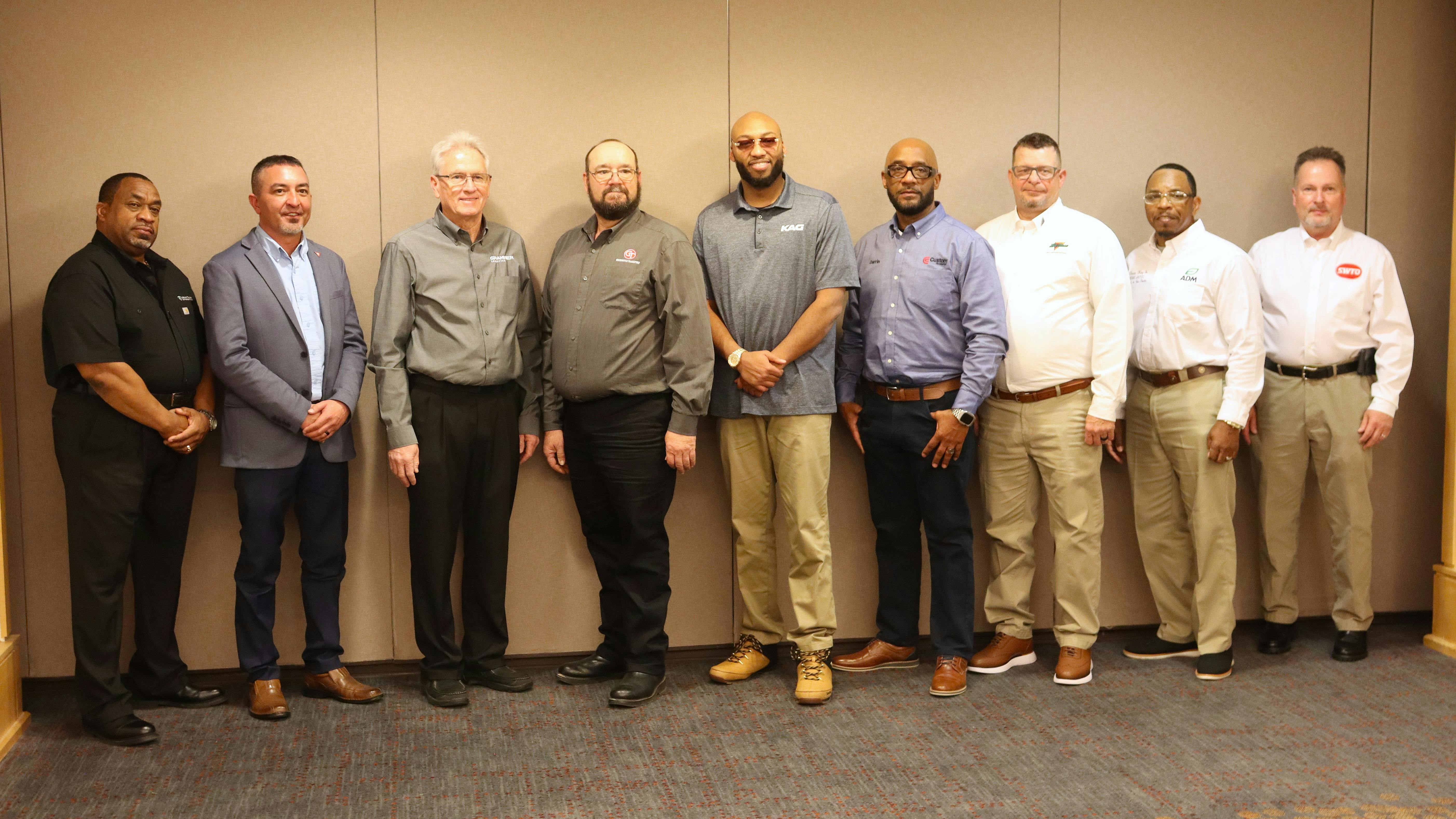 NTTC's 2024-25 Driver of the Year finalists recently gathered in Arlington, Virginia, for the final round of judging. From left to right are Ed Heard, reigning Driver of the Year Dave Powell, Mark Schroyer, Heath Leitzke, Michael Key, Darrin Guillory, Bruce Jones, Travis King, and Jwill Kosier.