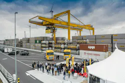 Guests gather at the AZT terminal during the official opening ceremony.