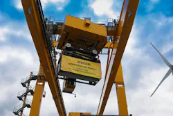 The towering gantry crane at the AZT terminal, equipped for intermodal container handling.