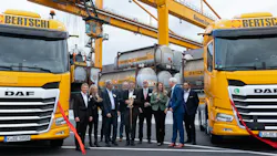 Ribbon-cutting celebration at the AZT terminal with Bertschi representatives.