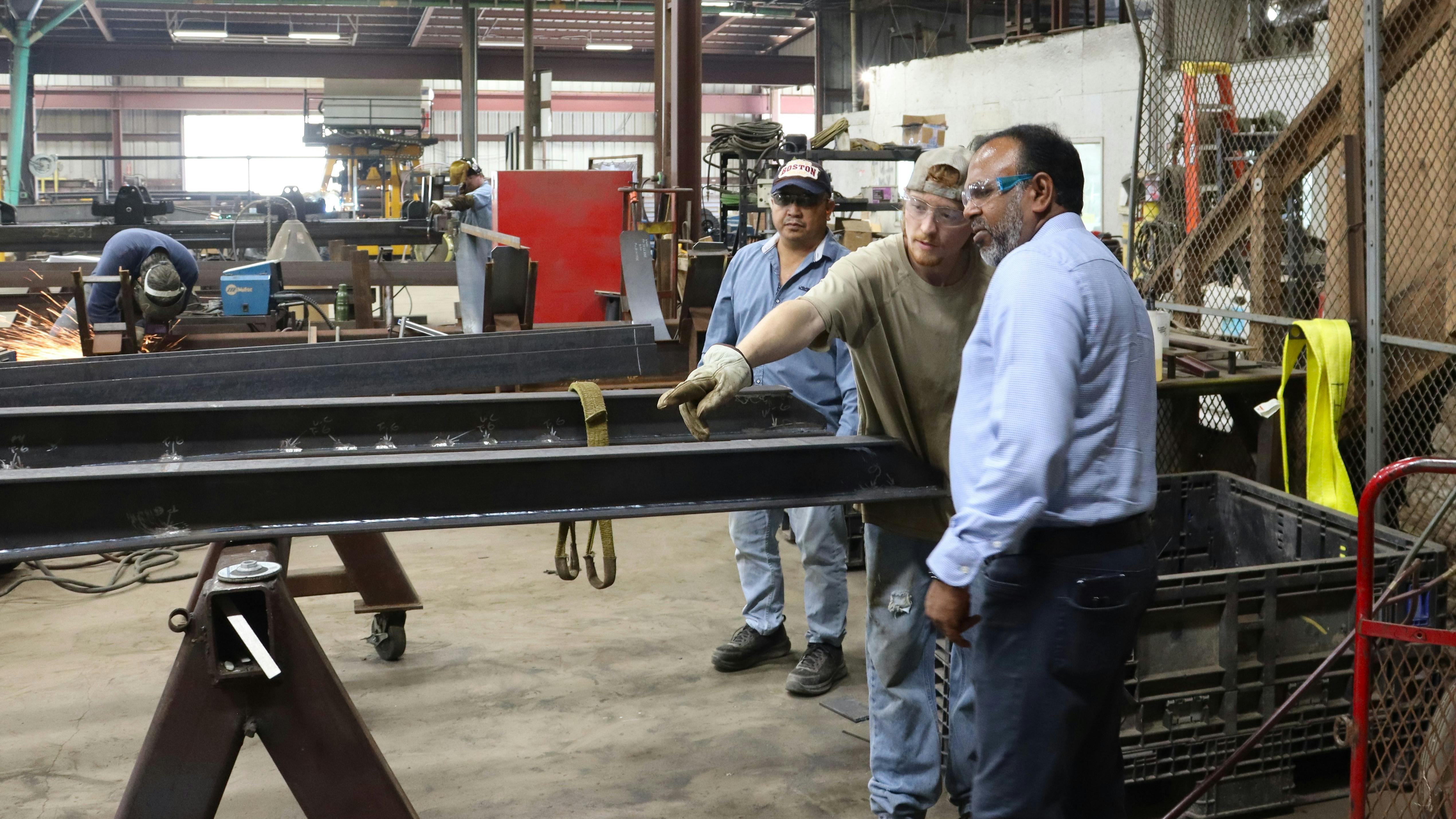 Pratap Lingam, Kwik Equipment president and CEO, at right, is dedicated to innovation in business strategy, equipment design, and customer service.