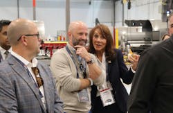 NTTC Chairman David Price, executive vice chairman at United Petroleum Transports, shares a laugh with Hendricks Holding Chairman Diane Hendricks during the tour of STE's new manufacturing facility. NTTC Chairman David Price, executive vice chairman at United Petroleum Transports, shares a laugh with Hendricks Holding Chairman Diane Hendricks during the tour of STE's new manufacturing facility.
