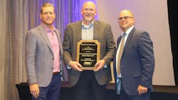 Wade Harrison, Service Transport Company president, at center, won National Tank Truck Carriers’ 2021 Harvison Division Safety Professional of the Year award. Wade Harrison, Service Transport Company president, at center, won National Tank Truck Carriers’ 2021 Harvison Division Safety Professional of the Year award.
