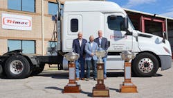 Bill Marchbank, Trimac Transportation SVP of mergers and acquisitions integrations, at right, helped the company secure its fourth Heil trophy this year. Bill Marchbank, Trimac Transportation SVP of mergers and acquisitions integrations, at right, helped the company secure its fourth Heil trophy this year.