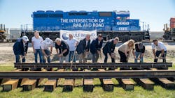 The Gulf Inland Logistics Park team and elected officials take part in a rail spike ceremony. The Gulf Inland Logistics Park team and elected officials take part in a rail spike ceremony.