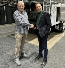 Tremcar President Daniel Tremblay, at right, shakes hands with Steve Fultz, owner of Post Leasing & Sales in Knoxville, Tennessee, after cementing their new distribution partnership. Tremcar President Daniel Tremblay, at right, shakes hands with Steve Fultz, owner of Post Leasing & Sales in Knoxville, Tennessee, after cementing their new distribution partnership.