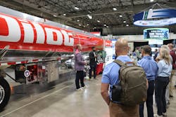 Brent Hickman, Pilot Compnay director of equipment, maintenance, and fleet sales, at left, and Adwait Kulkarni, Drōv Technologies vice president of trailer engineering, highlight the benefits of using EnTrans International’s Tank Ai smart trailer system on a Heil fuel tanker during Tank Truck Week 2025 in Kansas City, Missouri. Brent Hickman, Pilot Compnay director of equipment, maintenance, and fleet sales, at left, and Adwait Kulkarni, Drōv Technologies vice president of trailer engineering, highlight the benefits of using EnTrans International’s Tank Ai smart trailer system on a Heil fuel tanker during Tank Truck Week 2025 in Kansas City, Missouri.