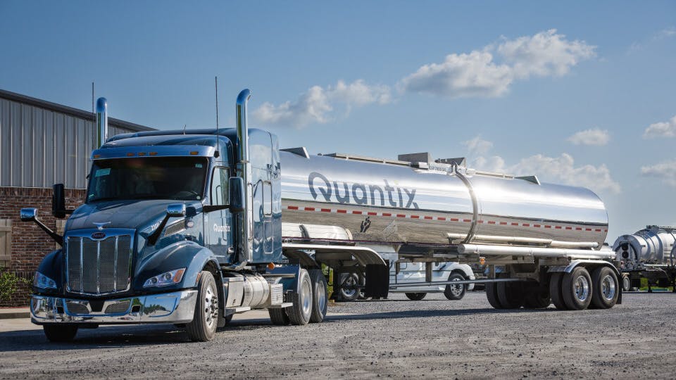 A Quantix truck at one of the company&rsquo;s operational facilities, supporting the safe and reliable transportation of bulk liquid materials across North America.