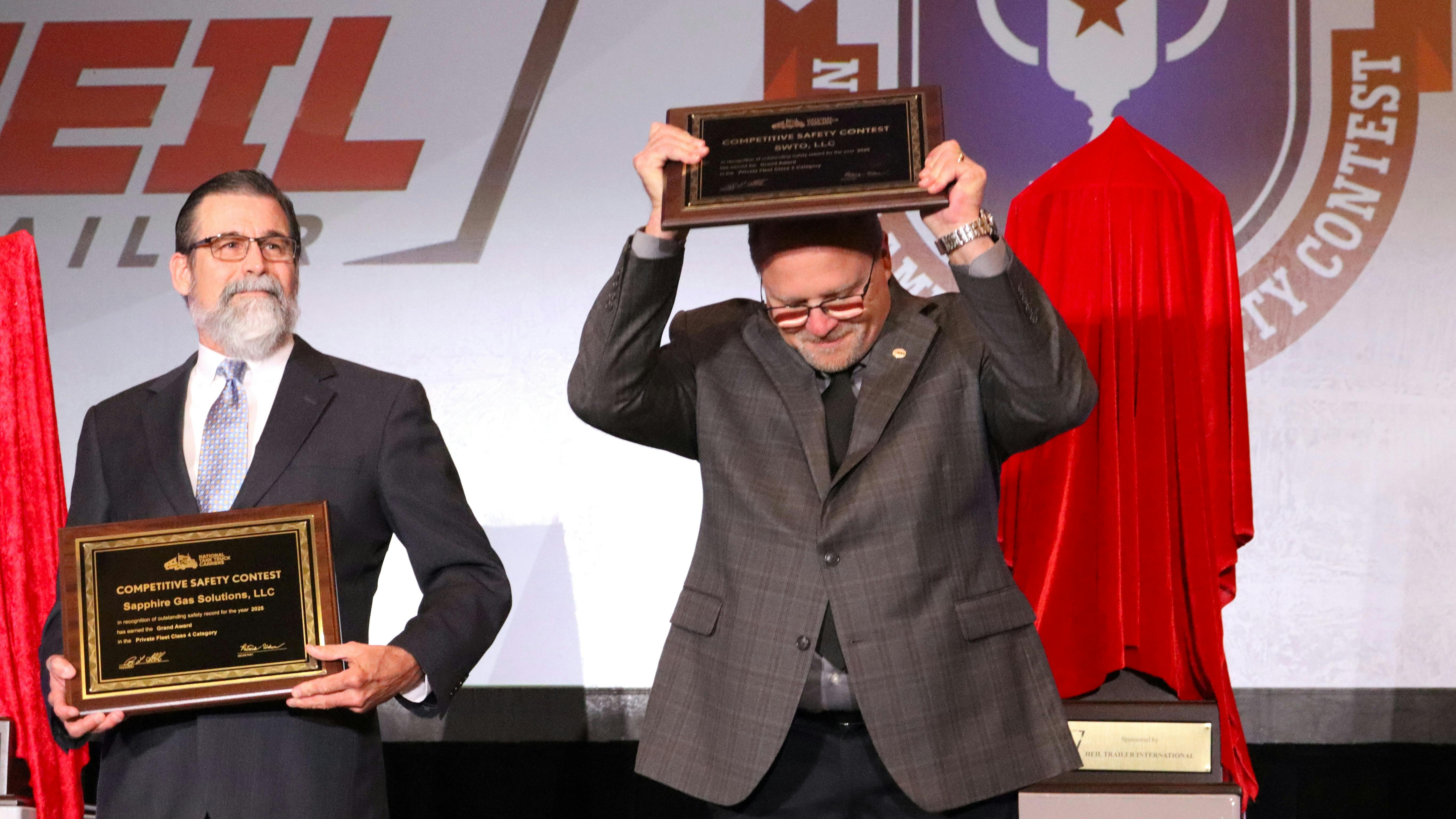 Ronnie McCoy, SWTO manager of fleet safety, training, and compliance, raises his plaque in celebration upon hearing his company revealed as the private-fleet Grand Champion in National Tank Truck Carriers&rsquo; 2025 North American safety contest during the 2026 NTTC Annual Conference in Baltimore.