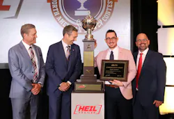 The Usher team admires their newly acquired Heil trophy as Ryan Streblow, at right, joins them on stage. The Usher team admires their newly acquired Heil trophy as Ryan Streblow, at right, joins them on stage.