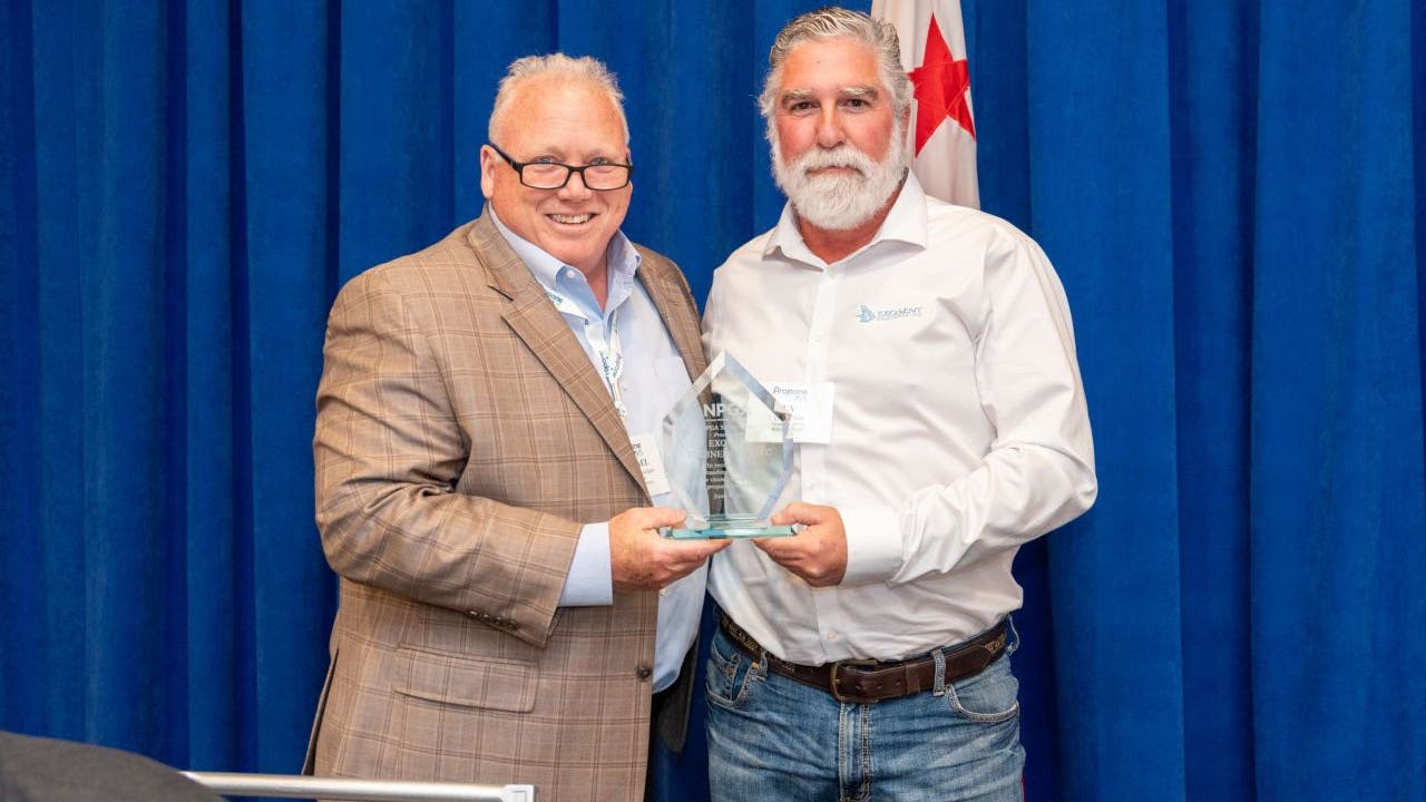 Immediate past National Propane Gas Association chair Michael Hopsicker, at left, presents Exosent Engineering founder and president Uv Doron with the 2026 NPGA Safety Award during the association's annual meeting in Washington, D.C.