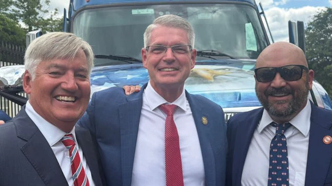 NTTC Advocacy Chair Hans Schaupp, at left, and NTTC Chairman Jeremy Mairs, at right, joined FMCSA Administrator Derek D. Barrs at the White House launch event for the new Freedom Haulers campaign.