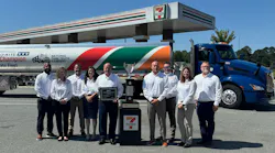 The SWTO team proudly displays the private fleet's championship hardware in front of a specially wrapped tank trailer.