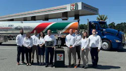 The SWTO team proudly displays the private fleet's championship hardware in front of a specially wrapped tank trailer.