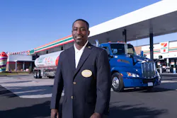SWTO driver Jefferson Benjamin, a member of the fleet's prestigious Gold Oval Club, wears the emblem recognizing his 10 consecutive years of safe driving with pride.