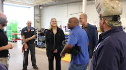 STE inside sales representative Paige Cushing (center) smiles as UPT’s veteran maintenance crew realizes they’ve been “Punk’d.” Her surprise shop visit served as a lighthearted finale to a major milestone week for UPT, which celebrated its 60th anniversary in Oklahoma City by hosting an open house at its new downtown headquarters and showcasing custom STE tank trailers at Tank Truck Week 2026.