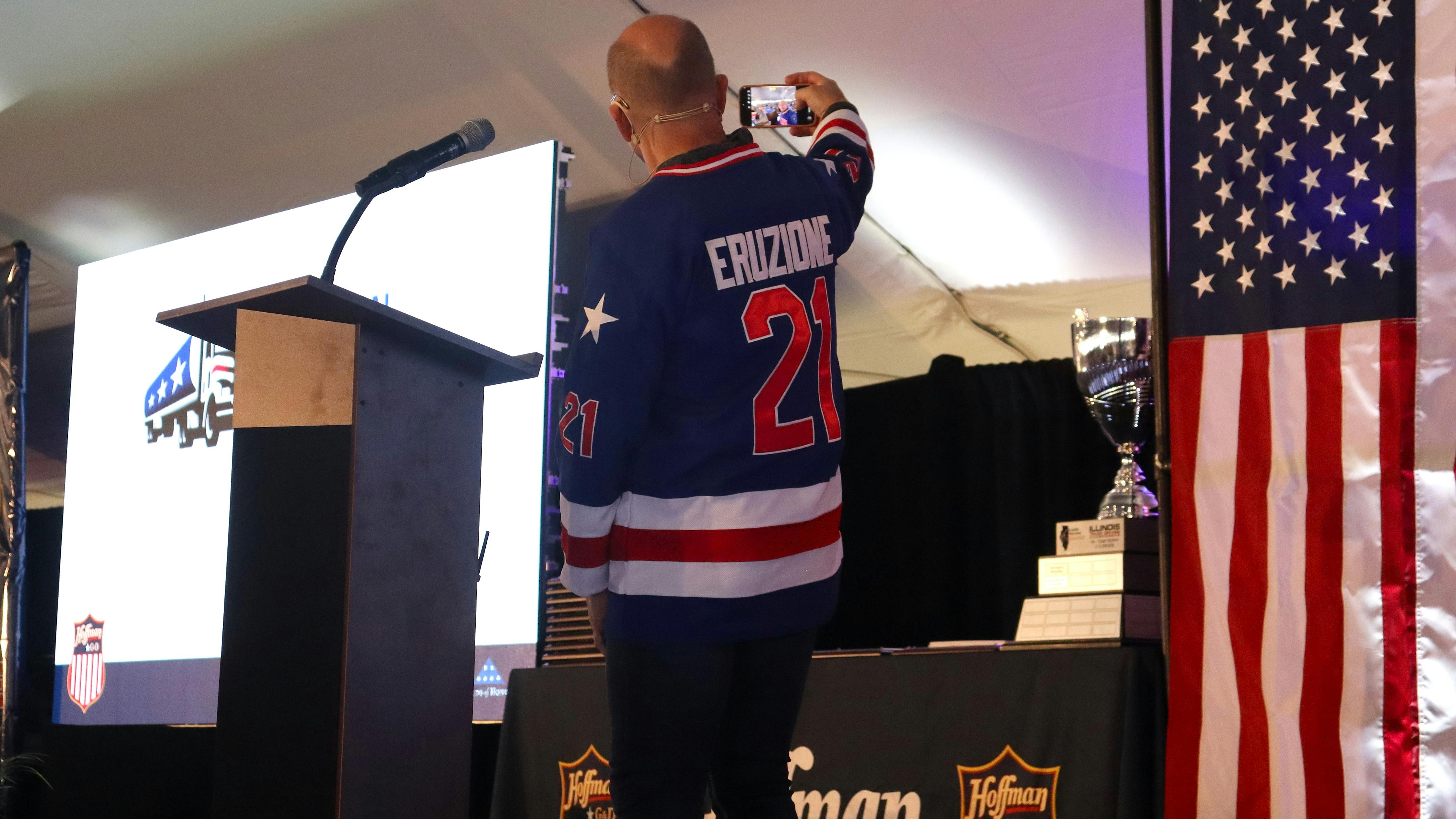 G&amp;D/Hoffman Chief Operating Officer Jerry Curl takes a selfie on stage for Mike Eruzione, captain of the 1980 U.S. Olympic hockey team, who was originally scheduled to deliver the keynote address but had his flight nixed by inclement weather.