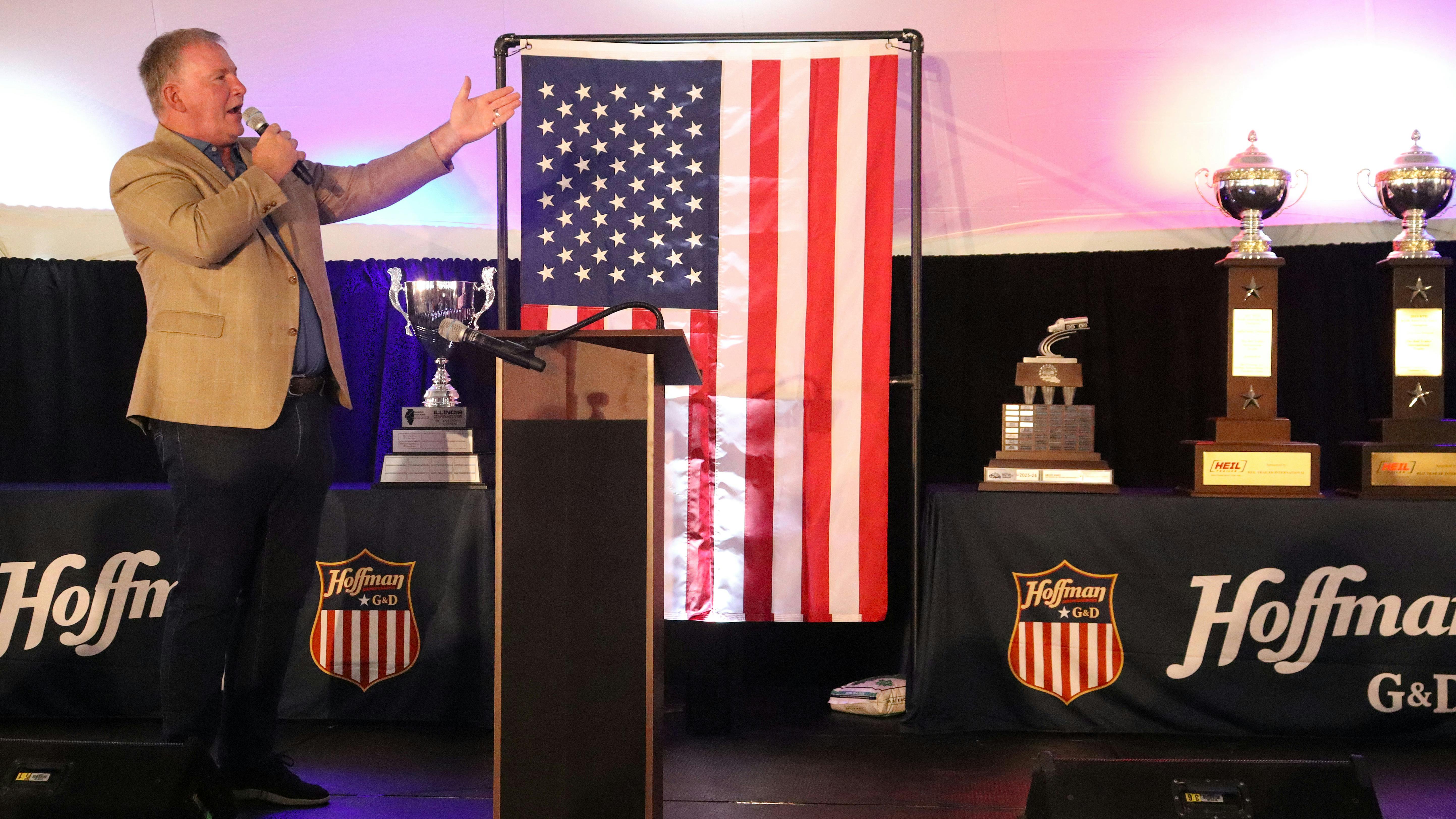 Legendary singer Jim Cornelison delivers a surprise, rousing performance of the national anthem alongside G&amp;D/Hoffman&rsquo;s collection of national safety trophies. When severe weather grounded scheduled guest speakers at the 17th annual employee appreciation event, company leaders executed a flawless pivot to save the massive celebration, perfectly reflecting the event&rsquo;s &ldquo;hold the line&rdquo; theme of meeting unexpected challenges proactively.